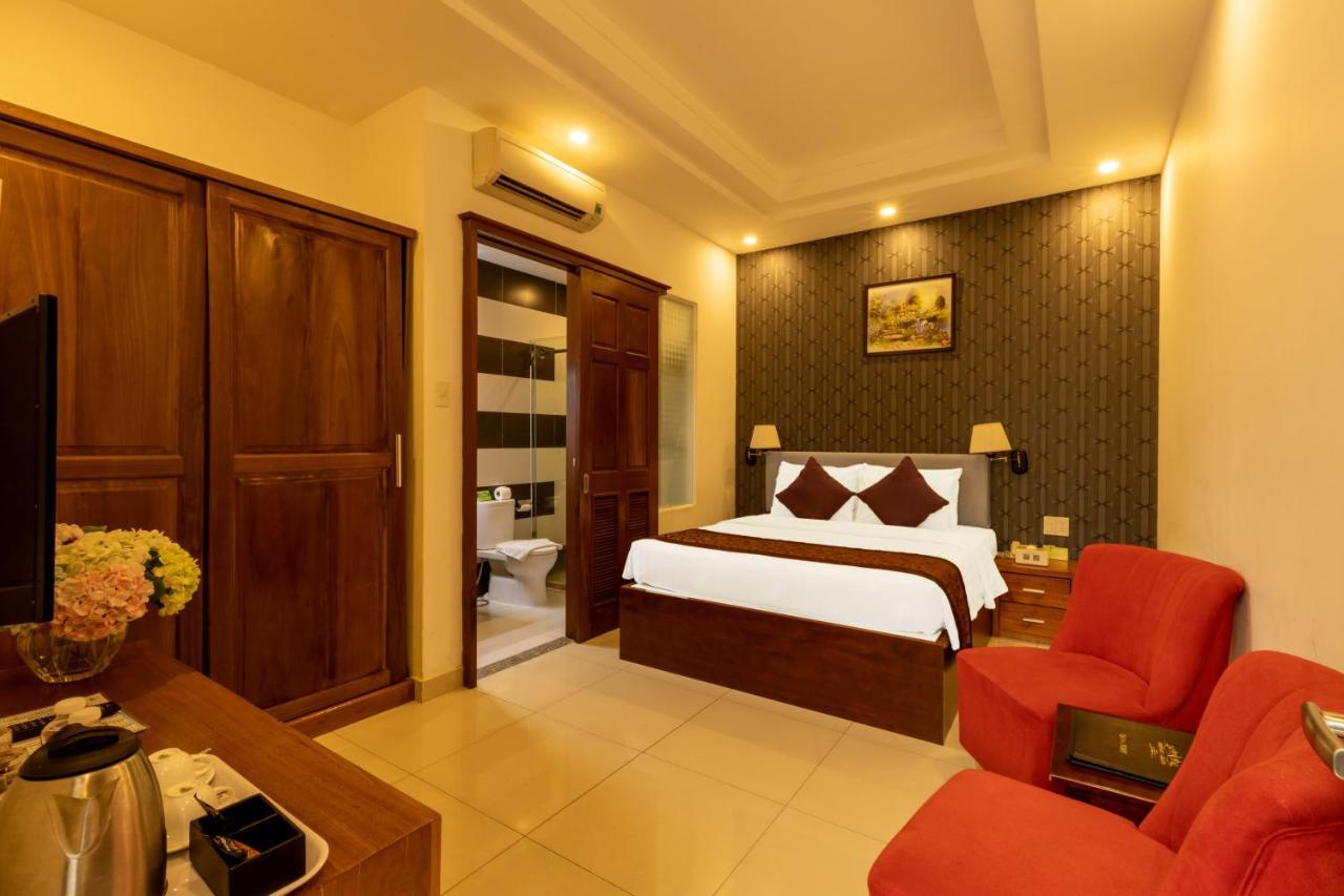 Airport Saigon Hotel - Gan Am Thuc Dem Cho Pham Van Hai Хошимин Экстерьер фото