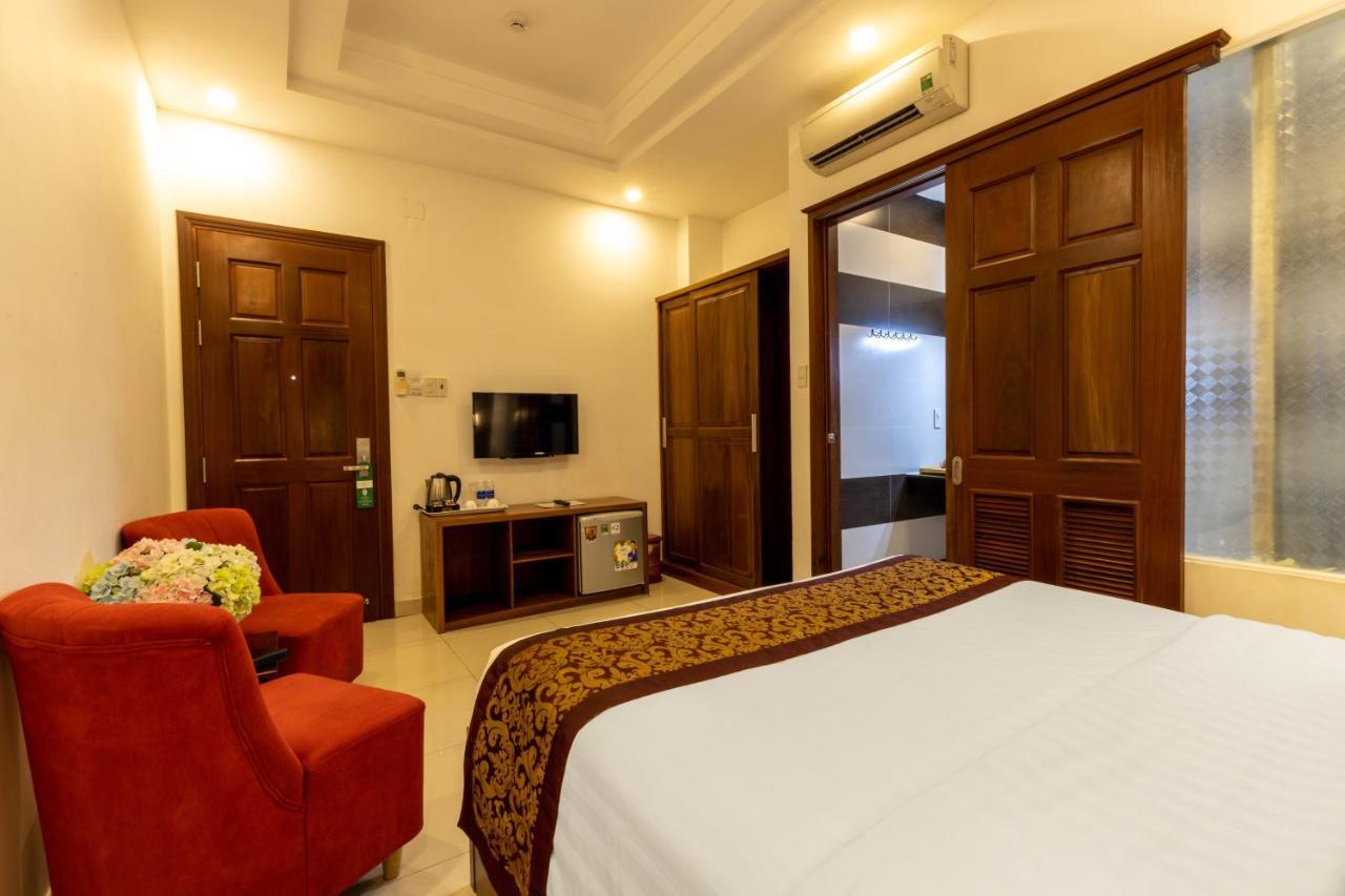 Airport Saigon Hotel - Gan Am Thuc Dem Cho Pham Van Hai Хошимин Экстерьер фото